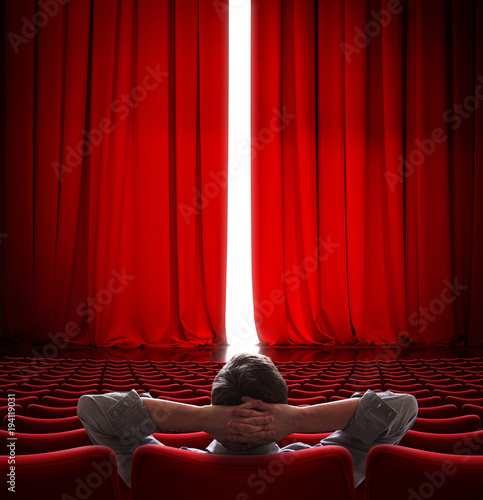 Vip Sitting In Front Of Slightly Open Movie Theater Red