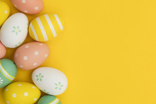 Painted Easter Eggs On A Bright Yellow Background