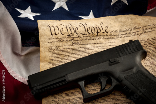 The second amendment and gun control in america concept with a handgun and the a Tableau sur Toile