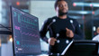 © Gorodenkoff - Close-up Shot of a Monitor With EKG Data. Male Athlete Runs on a Treadmill with Electrodes Attached to His Body while Sport Scientist Holds Tablet and Supervises EKG Status in the Background.