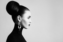 Retro Style Black And White Fashion Portrait Of Elegant Female Model With Hair Bun Hairstyle And Eyeliner Makeup