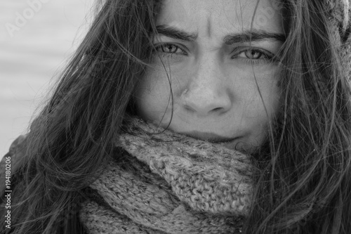 Close Up Portrait Of A Sullen Angry Alarmed Dissatisfied Sad