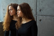 © Alexandr - portrait of two beautiful young girls of twin sisters with flowing hair