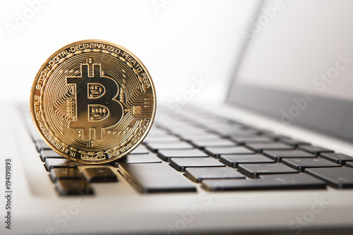 Golden Bitcoin New Virtual Money On Notebook A Visual A Visual Representation Of Digital Cryptocurrencies Bitcoin Are Fully Dematerialized And Decentralized Electronic Currencies Shallow Depth Field