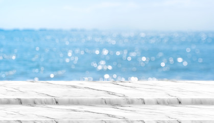 Aufkleber - Empty white marble table top with blur blue sky and sea boekh background in sunny day,Mock up template for display or montage of product or content use as banner in social media ads