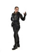 © faestock - full length portrait of female  soldier wearing black  tactical armour with arms raised, isolated on white studio background.