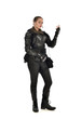 © faestock - full length portrait of female  soldier wearing black  tactical armour with arms raised, isolated on white studio background.