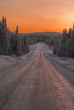 Fototapeta Do pokoju - sunset on ice and snow. The winter in swedish Lapland