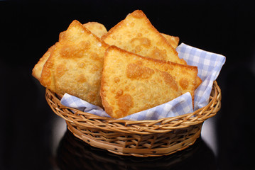 brazilian typical pastry called pastel in black background