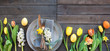 Table decoration with tulips and easter eggs