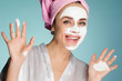 © mnelen.com - happy woman after shower applied cleansing mask on face
