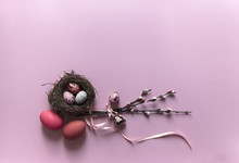 On A Pink Background, Willow Branches Blossomed Eggs Quail Chicken Nest With Three Eggs Color Top View Ribbon Bow Pink 