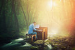 © Kevin Carden - Playing music in the forest