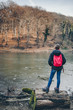 © kerkezz - Girl standing in front of frozen lake