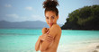 © Mark Adams - Lovely African woman standing topless on caribbean beach of bahamas