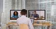 © Mark Adams - Successful group of business associates having internet based web conference over video chat. Black Hispanic and Caucasian team of office workers communicate using modern technology