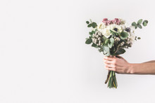 Cropped Shot Of Woman Holding Beautiful Bridal Bouquet Isolated On Grey
