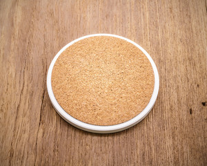 Poster - Beverage coaster mug made from ceramic material on retro background.