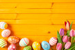 Colorful yellow Easter background with copy space