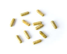 Herbal Capsules On White Background