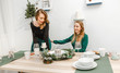 © EdNurg - Happy women couple at the festive table