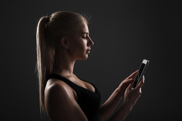 Wall Mural - Portrait of a healthy fitness woman dressed in sportswear