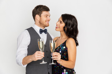 Wall Mural - happy couple with champagne glasses at party