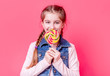 © tan4ikk - Teenage girl with colorful candy lollipop
