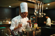 © Clique Images/Stocksy - Proficient Asian cook at work