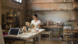 © Jelena Jojic Tomic/Stocksy - Furniture designer at her workshop