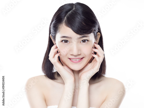 顔に手を添える女性 Stock Photo Adobe Stock