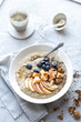 morning oat porridge with fresh fruits and tea