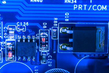  electronic circuit closeup in blue glow
