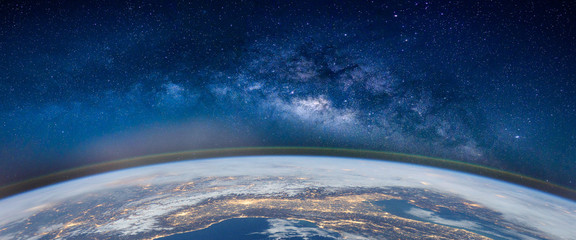 Landscape with Milky way galaxy. Earth and Aurora view from space with Milky way galaxy. (Elements of this image furnished by NASA)