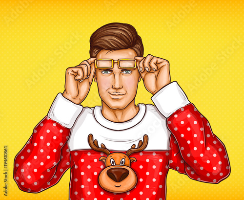 Fototapeta Vector pop art man in christmas red white sweater with deer print taking off glasses