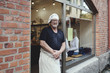 © Maskot - Portrait of senior male baker standing at bakery