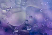 Mauve Oil And Water Bubble Abstract Background