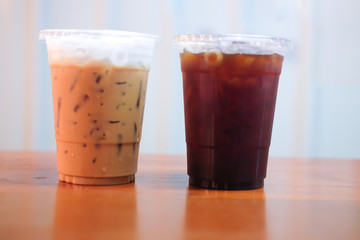 Two ice coffee on wooden table