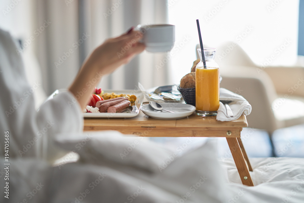 Breakfast in bed, cozy hotel room - obrazy, fototapety, plakaty 