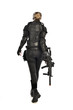© faestock - full length portrait of female  soldier wearing black  tactical armour, standing  with back to the camera holding a gun, isolated on white studio background.
