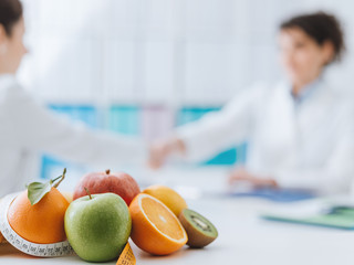 Wall Mural - Nutritionist meeting a patient in the office
