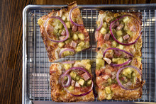 Close-up Of Hawaiian Pizza On Cooling Rack