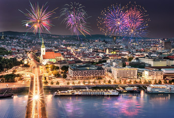 Canvas Print - Fireworks over the Old Town in Bratislava, new bridge over Danube river with evening lights in capital city of Slovakia,Bratislava