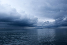Dramatic Storm Clouds Over The Sea. Baltic Sea. Seascape In Front Of A Storm.