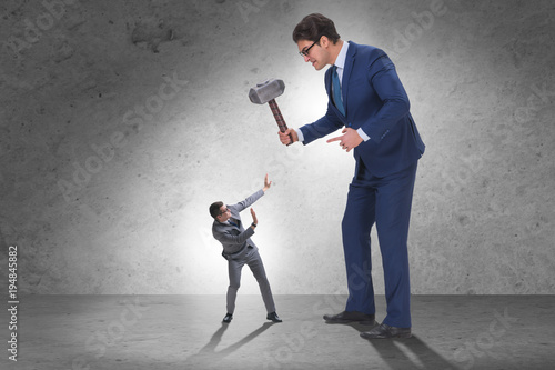 Cuadros en Lienzo Bad angry boss threatening employee with hammer