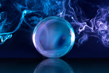 Crystal Ball In A Dark Blue Smoky Background