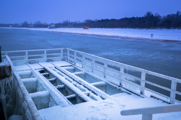 Snowy pier at Baltic Sea in Gdansk, Poland