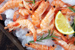 Raw fresh Prawns Langostino Austral. shrimp seafood with lemon and spices.