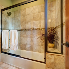 Master bathroom interior with close up of glass shower