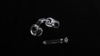 © lolabean - Striking Image of Quarts Nail and Quartz Banger for Marijuana on a black velvet background
